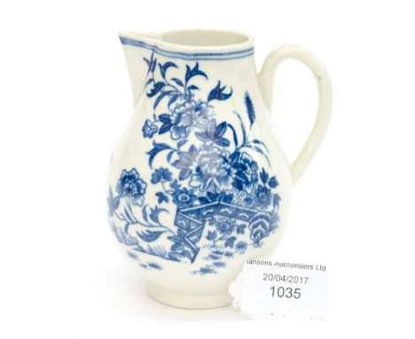 A Worcester porcelain sparrow beak jug, circa 1760, underglaze blue floral decoration and crescent mark
