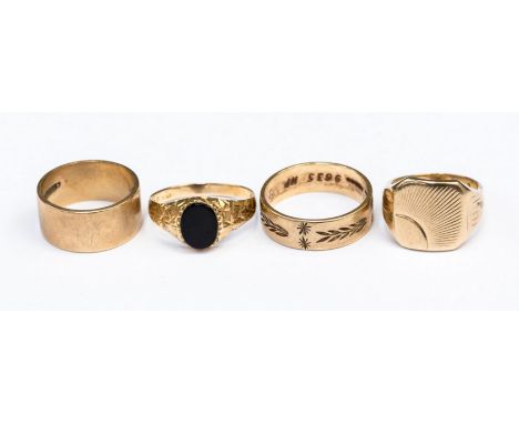 A 9ct gold and onyx signet ring, size L,  a 9ct gold square shape signet ring with sun ray engraving, size G, a 9ct gold engr