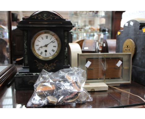 A circa 1960s electric Metamec mantle clock, with eight wristwatches and a stock watch (one bag and a clock) 