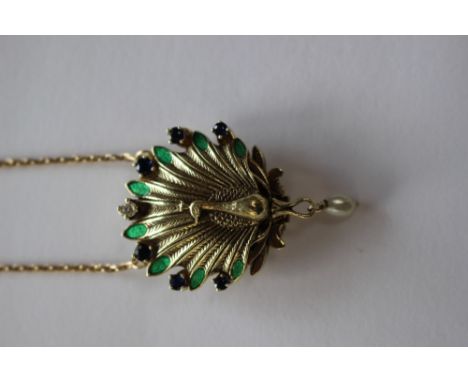 A Franklin Mint Faberge Imperial Peacock watch pendant with certificate and box, set diamond, pearl and sapphire