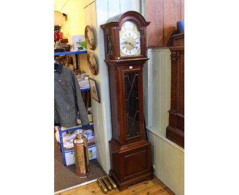 Mahogany and astragal glazed triple weight longcase clock with brass and silvered dial.