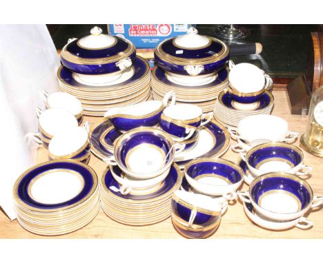 Crown Ducal blue and gilt eighty four piece dinner and tea service.