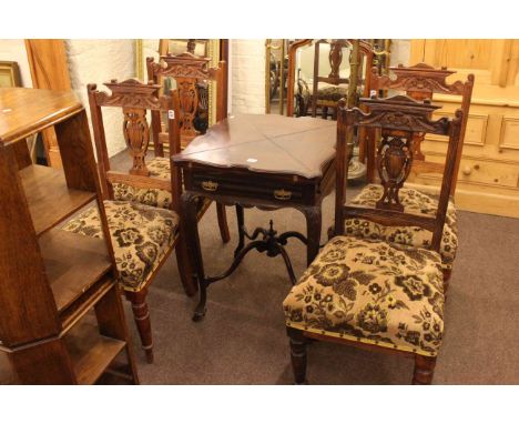 Edwardian mahogany envelope card table with single frieze drawer and four Edwardian dining chairs.