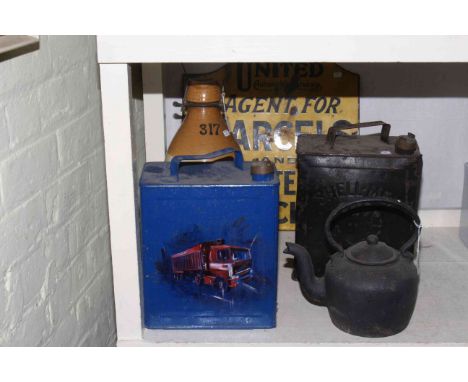 Stoneware bottle, enamel sign, two fuel cans and kettle.