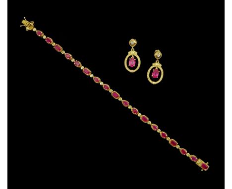 Silver-gilt ruby and white topaz bracelet and a pair of ruby and white topaz pendant stud earrings, both stamped 925Condition