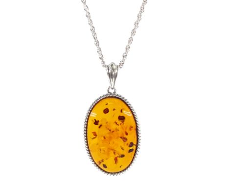 Silver oval Baltic amber pendant necklaceCondition Report:Pendant length = 45mm, good condition