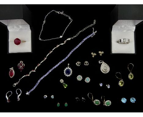 Silver stone set jewellery including two pairs of diamond earrings, diamond pendant, opal and white topaz earrings, tanzanite