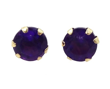 Pair of 9ct gold amethyst stud earringsCondition Report:Approx 0.25gm, diameter  4mm, good condition 