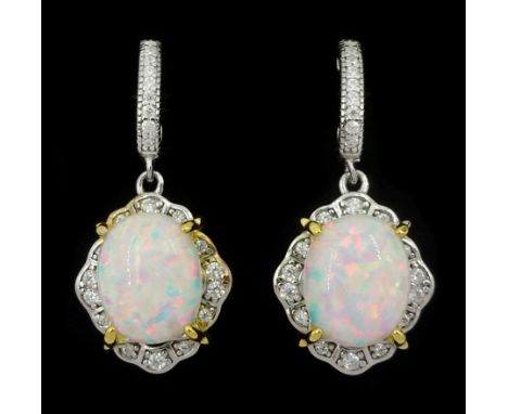 Pair of silver opal and cubic zirconia pendant stud earringsCondition Report:Length = 28mm, good condition