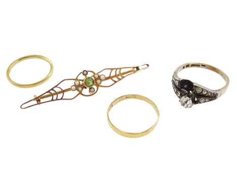 Two 18ct gold wedding bands, 9ct gold peridot and pearl brooch and a 9ct gold and silver paste ringCondition Report:18ct gold