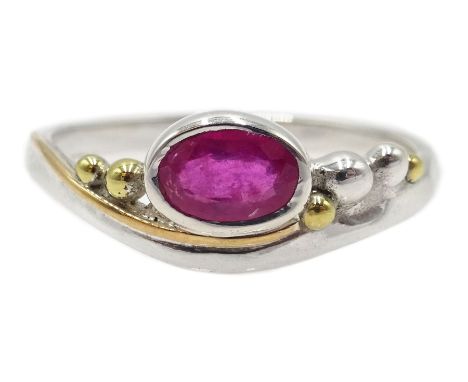 Silver and 14ct gold wire oval ruby ring, stamped 925 Condition Report:Size N, good condition