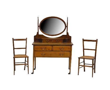 Edwardian mahogany dressing table with oval mirror above two trinket drawers, the bade with two short and one long drawer, wi