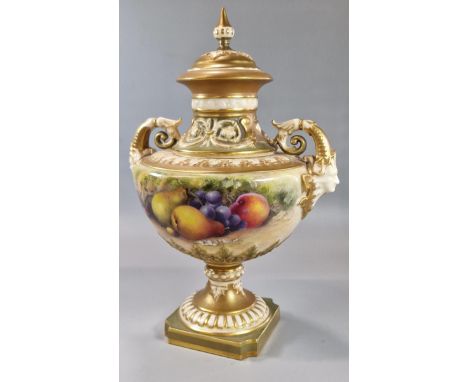 Royal Worcester pedestal urn shaped two handled vase, hand-painted with fruits on a mossy background. Signed 'Ricketts'. Puce