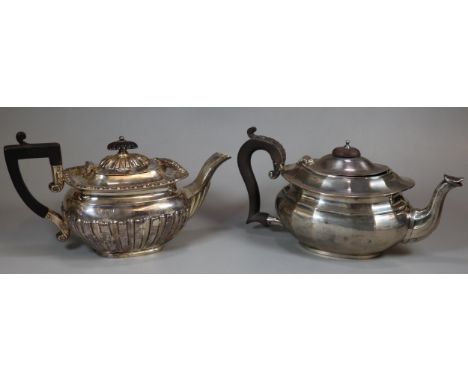George V silver fluted teapot with ebonised handle and fluted finial, by Pinder Brothers, Sheffield 1905. 12.2 troy oz approx
