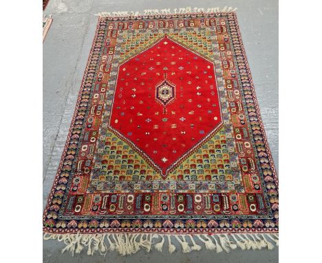 Large vintage Afghan/Iranian Kilim type carpet with weave and fringed tassels, central geometric medallion with multi-coloure