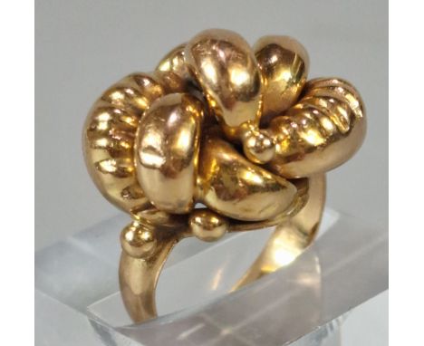 18ct gold weave design ring. 9.4g approx. Size M. (B.P. 21% + VAT) 