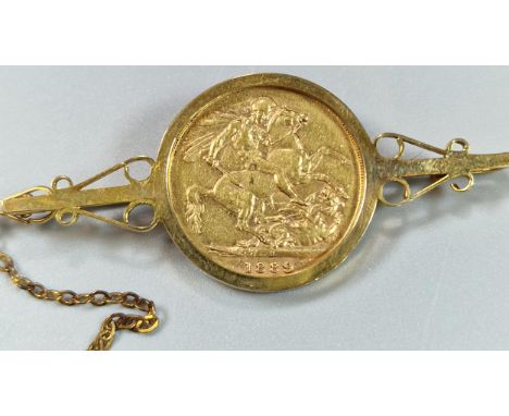 Edward VII gold half Sovereign dated 1909 in pierced foliate ring mount. 9.5g approx. (B.P. 21% + VAT) 
