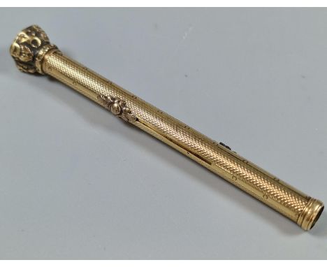 Early 20th century yellow metal engine turned propelling pencil with shield shaped hardstone seal terminal with initials. App