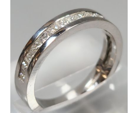 18ct white gold half diamond eternity ring, possibly Princess cut diamonds, 0.6 carat approx. 5.2g approx. Size M1/2. (B.P. 2