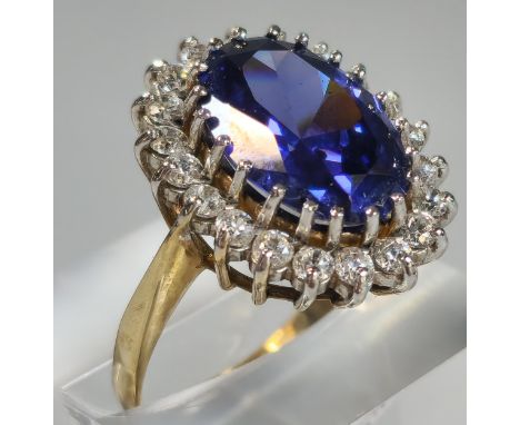 9ct gold Cubic Zirconia and blue oval stone dress ring. 5.6g approx. Size O1/2. (B.P. 21% + VAT) 