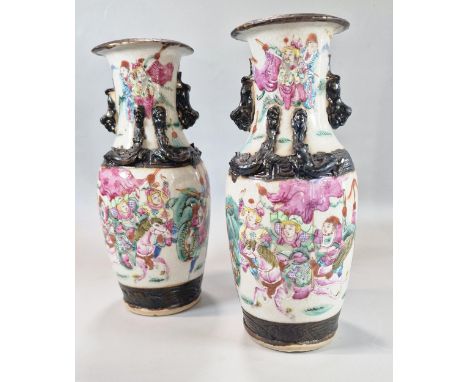 Pair of Chinese porcelain crackle glaze Warrior vases with polychrome panels of horse-men and foot soldiers, with applied Chi