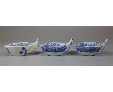 19th century Spode blue and white transfer printed pottery 'Indian Sporting' border butter boat, two, together with a similar