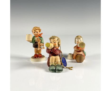 Hand painted collectible figurines including Boy with Horse single candle holder, Little Gabriel, and girl playing trumpet. G