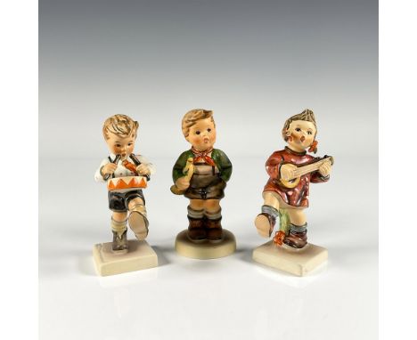 Hand painted in matte finish, including Happiness girl with mandolin, Little Drummer boy, and Trumpet Boy. Depicts German chi