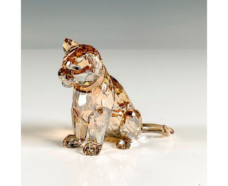 Multifaceted light brown crystal with black eyes. Swarovski etched backstamp. This item has its original box, 4.75"L x 4.75"W