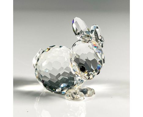 Swarovski Crystal Mini Reclining Rabbit, a member of the In a Summer Meadow category. Crafted from clear crystal, this mini r