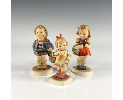 Three hand painted figurines titled School Girl, I Brought You a Gift, and From Market. Each figure captures young German chi