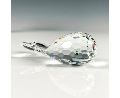 Clear crystal body with facets throughout to his tail fin. Azure eyes are complemented by his satin crystal mouth. Swarovski 