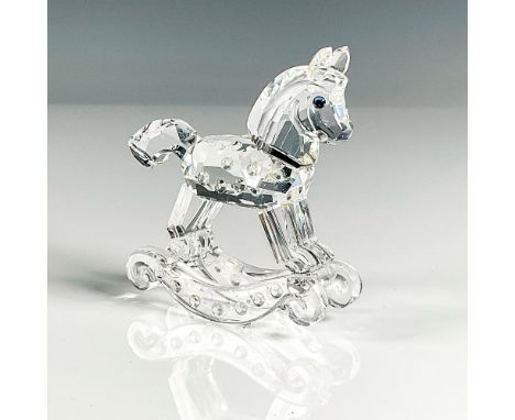 Multifaceted clear crystal with black eyes. Swarovski etched backstamp. This item has its original box, 4.75"H x 3.25"dia. Is