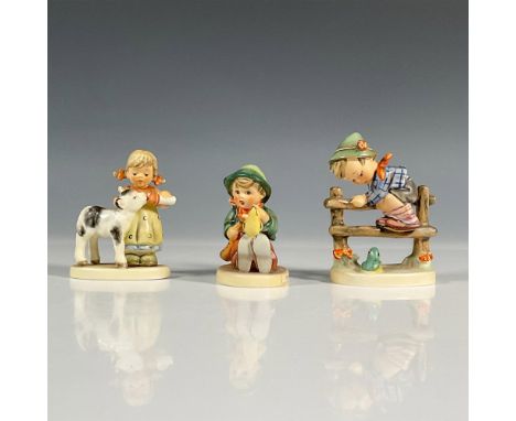 Hand painted collectibles that include Friendly Feeding depicted as a young girl feeding a goat, Singing lesson depicted as a