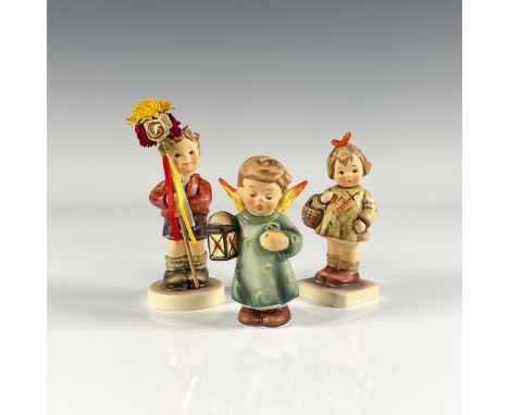Hand painted in matte finish collectibles including I Brought You A Gift, Spring Gifts, and Angel with Lantern. Depicts a you