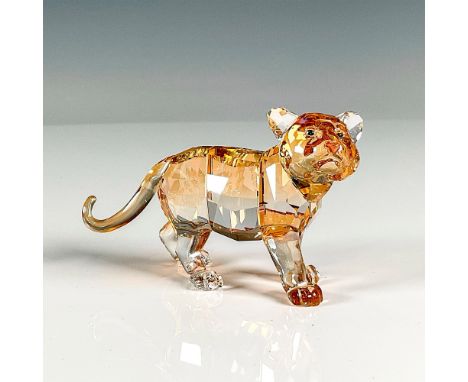 Multifaceted light brown crystal with black eyes and pink nose. Swarovski etched backstamp. This item has its original box, 4