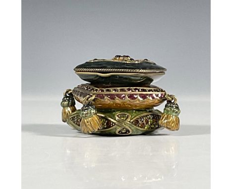 A very attractive enameled box with inset Swarovski crystals in the form of stacked Persian style pillows. Enameled interior 