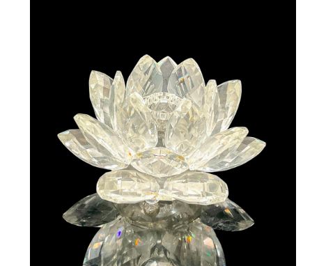 Clear multifaceted crystal lotus flower candleholder. Swarovski Silver Crystal etched backstamp. Issued: 20th centuryDimensio