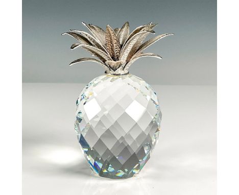 Part of the Sparkling Fruit collection this figurine has hammered rhodium leaves on the crystal faceted body. Swarovski backs