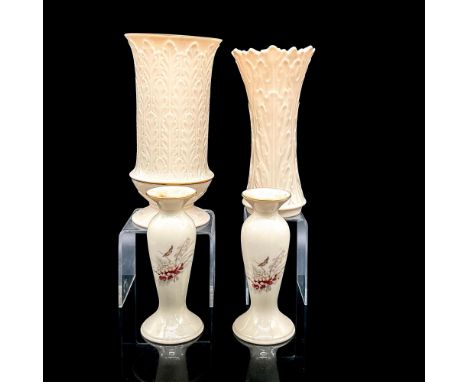 Four cream colored porcelain decorative items. Two candlestick holders with floral and butterfly motif; 6.5"H x 3"dia. Vase w