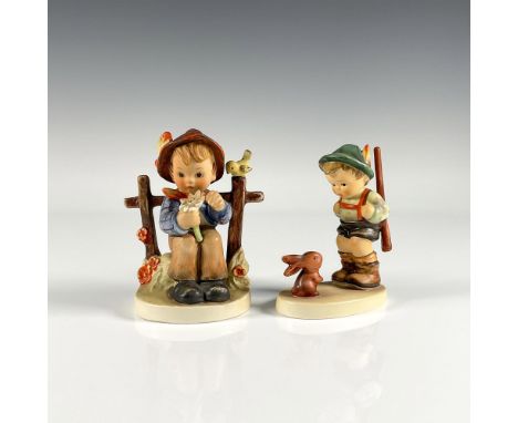 Two colorful collectible Goebel figurines including Sensitive Hunter depicting a young village boy gazing at a rabbit and She