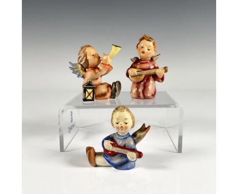 Three Goebel collectibles of seated angels, each titled Angel Serenade, Angel with Lute, and Tuneful Angel. Features each ang