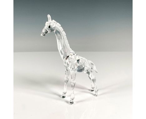 Multifaceted clear crystal with radiant eyes. This item has its original box, 7.5"L x 7.25"W x 3.25"H. Issued: 20th centuryDi