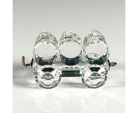 Part of the Silver Express train set with clear crystal representation has three barrels set on flat bed with hooks in front 