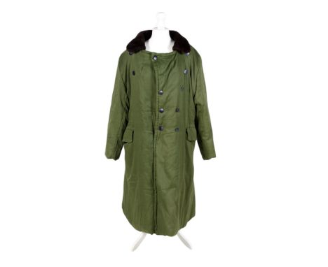 A Chinese vintage military winter overcoat. Having a green exterior with faux fur collar, stamped to the interior, no. 3852, 
