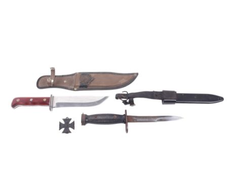Three pieces of militaria. Comprising an American M7 knife bayonet with M10 scabbard, blade L17cm, a replica Tramontina knife