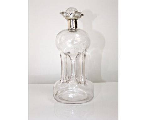 An hour glass shaped decanter with silver collar - Mappin & Webb, London 1908