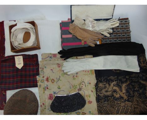A large collection of good quality vintage textiles and fabric to include a large cream coloured panel with printed floral de