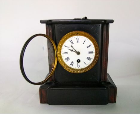 A Victorian black slate mantle clock with 8 day timepiece (key and pendulum)