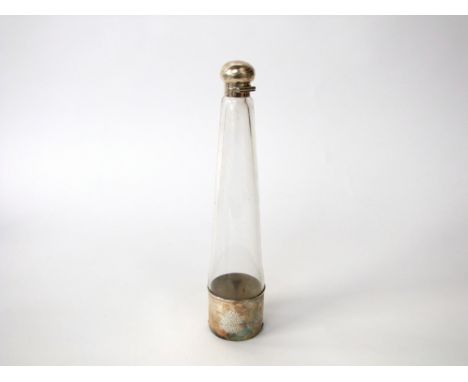 A silver mounted glass flask of cylindrical tapering form with silver foot and hinge collar and folding cap, 27 cm high